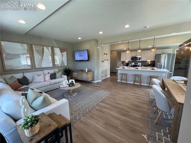 living room with light hardwood / wood-style floors