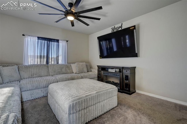 living room with ceiling fan and carpet