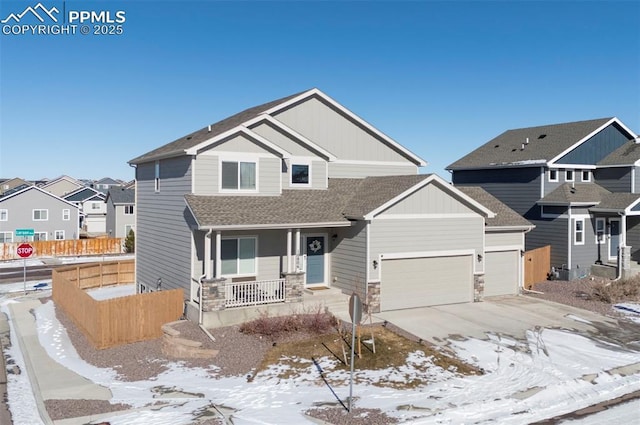 craftsman-style home featuring a garage and covered porch