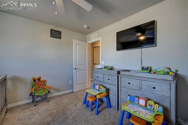 game room featuring ceiling fan and light colored carpet