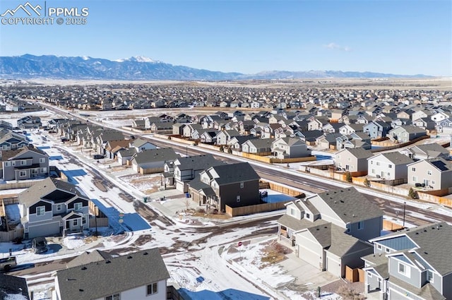 bird's eye view with a mountain view