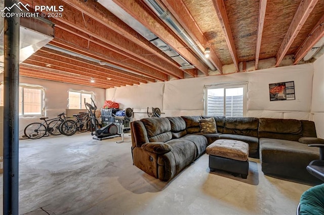 living room with concrete flooring