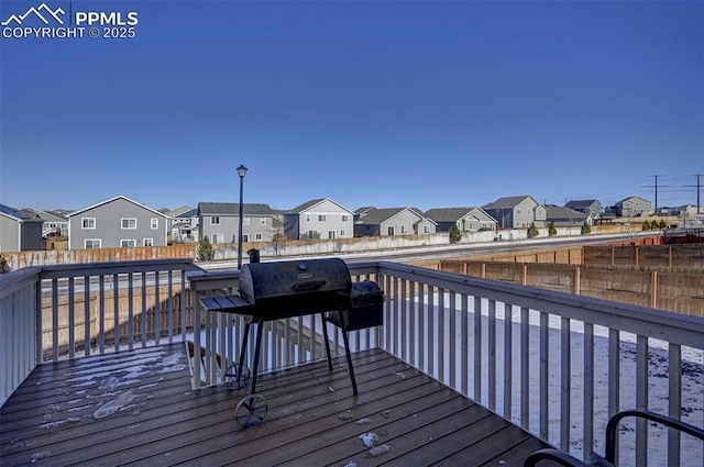 wooden deck with area for grilling