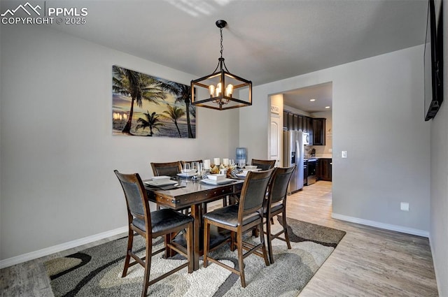 dining room with light hardwood / wood-style flooring