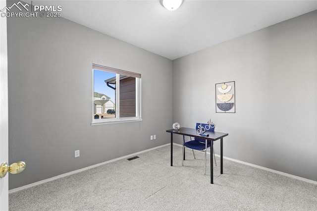 view of carpeted office space