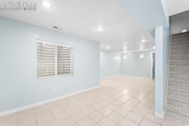 empty room featuring light tile patterned flooring