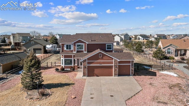 front of property with a garage