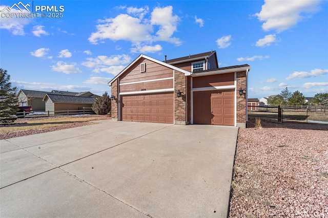 view of side of property featuring a garage