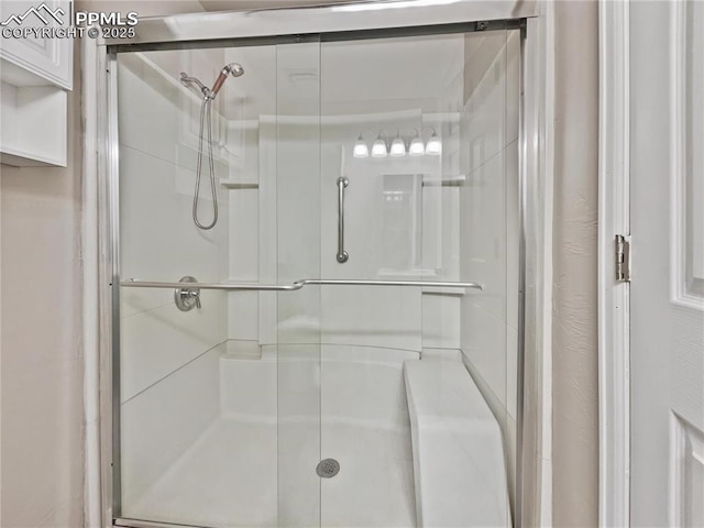 bathroom with an enclosed shower