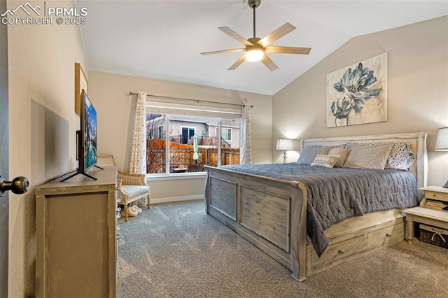 bedroom with lofted ceiling, ceiling fan, and carpet