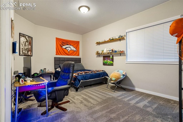 carpeted bedroom with a textured ceiling