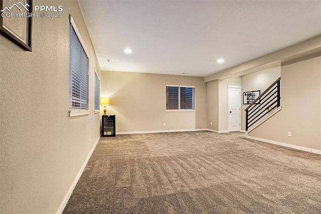 unfurnished living room with carpet floors