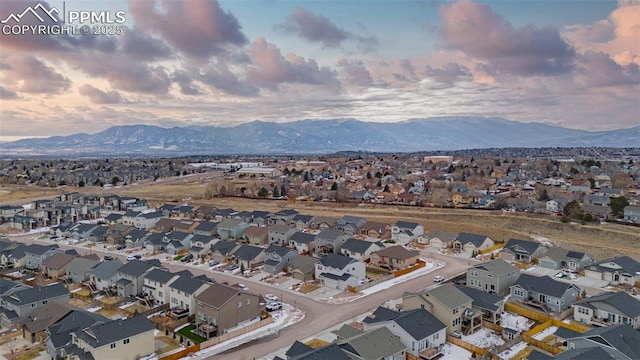 aerial view at dusk with a mountain view