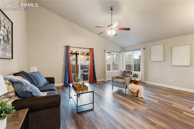 living room featuring dark wood-type flooring, ceiling fan, and high vaulted ceiling