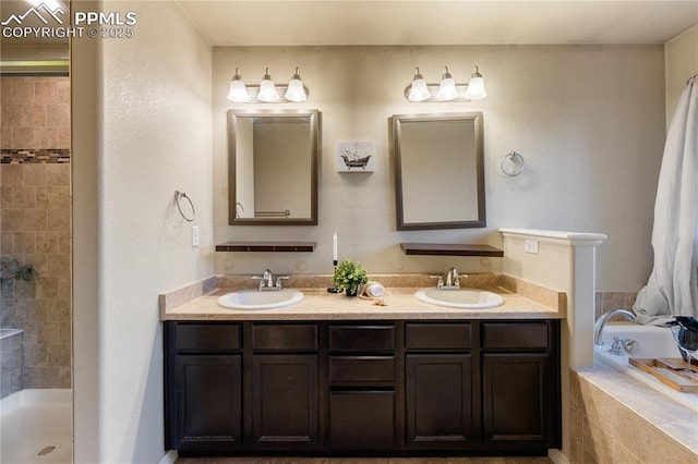 bathroom featuring vanity and plus walk in shower