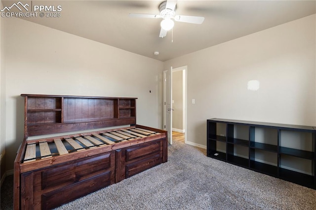 bedroom featuring light carpet and ceiling fan