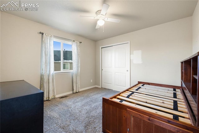 bedroom featuring ceiling fan, carpet flooring, and a closet