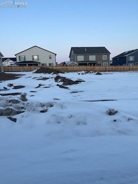 view of yard covered in snow