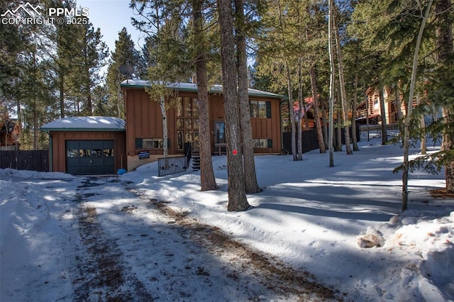 view of front of property with a garage