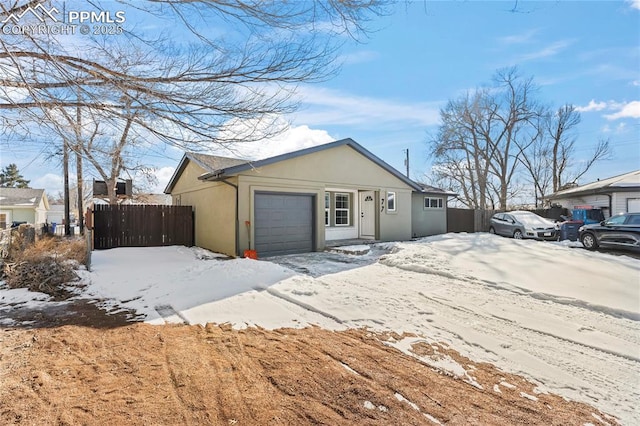 single story home featuring a garage