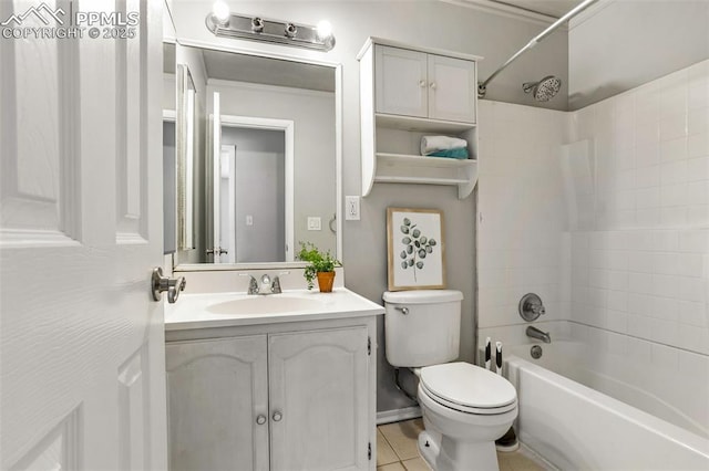 full bathroom with tiled shower / bath, vanity, toilet, and tile patterned flooring