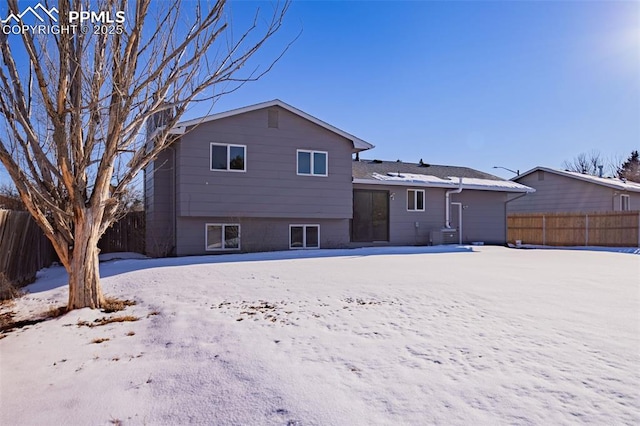 view of snow covered house