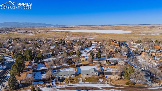 bird's eye view with a mountain view