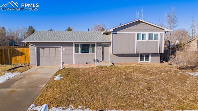 split level home featuring a garage