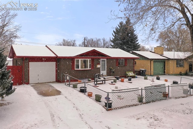 single story home with a garage