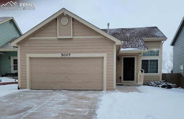 view of front of home with a garage