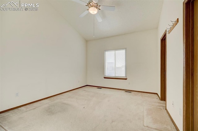 unfurnished bedroom with vaulted ceiling, light carpet, and ceiling fan