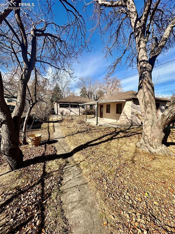 back of property featuring a patio