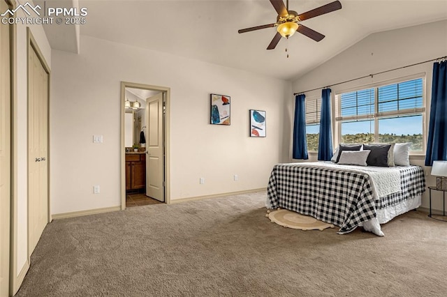 bedroom featuring connected bathroom, vaulted ceiling, ceiling fan, and carpet flooring