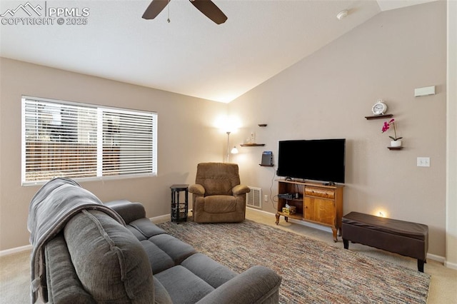 carpeted living room featuring vaulted ceiling and ceiling fan