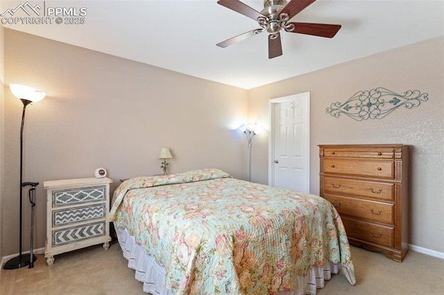 bedroom with light carpet and ceiling fan