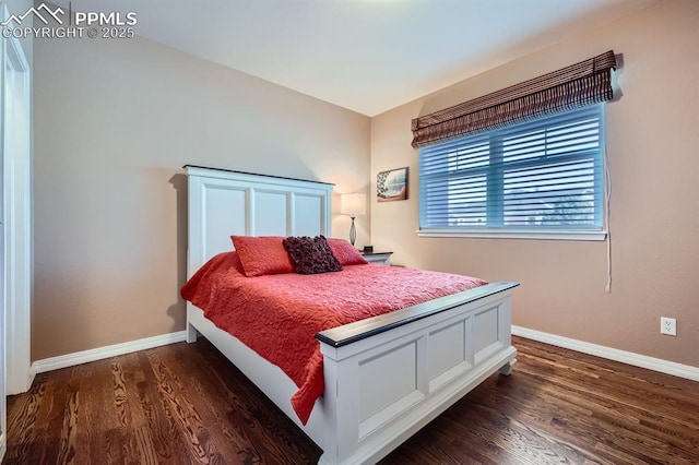 bedroom featuring dark wood-type flooring