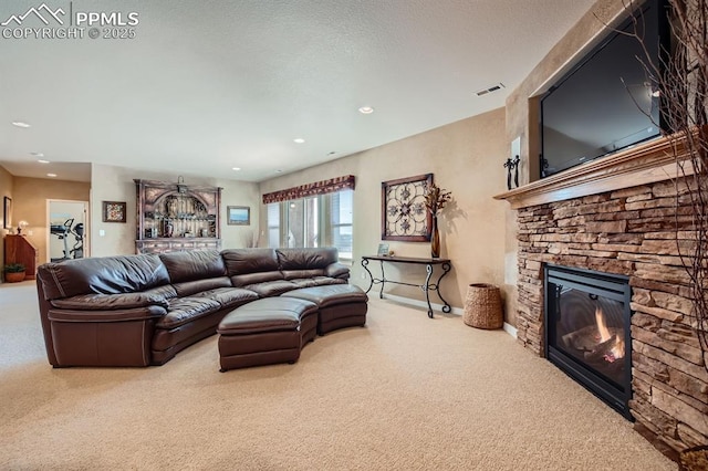 living room featuring carpet floors and a fireplace