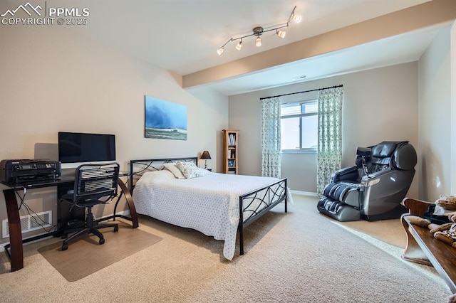 bedroom with light colored carpet and beam ceiling