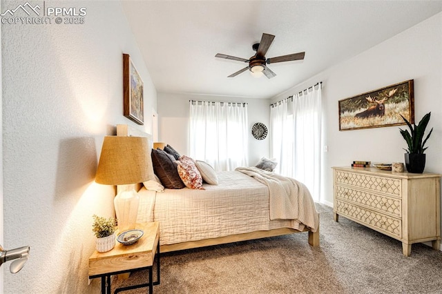 carpeted bedroom with ceiling fan