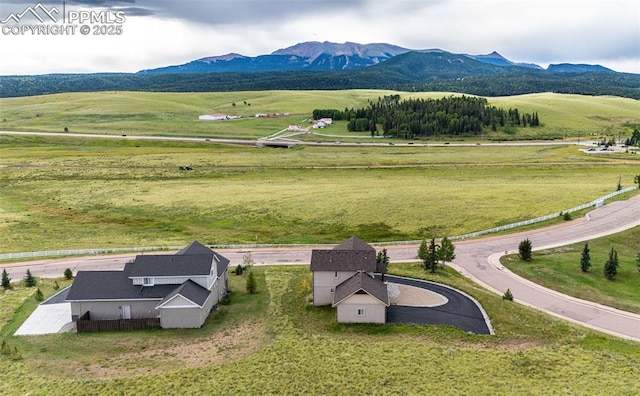 view of mountain feature featuring a rural view