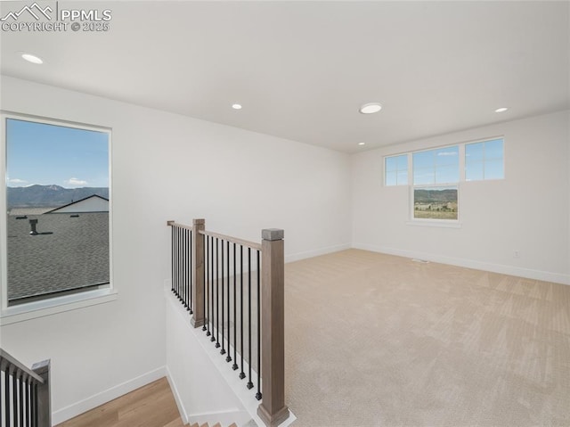 interior space with recessed lighting and baseboards