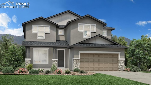 view of front facade with stone siding, a front lawn, concrete driveway, and a shingled roof