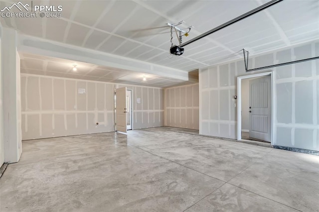 241 N Front St Unit 101, Monument, CO 80132 - garage featuring a garage door opener