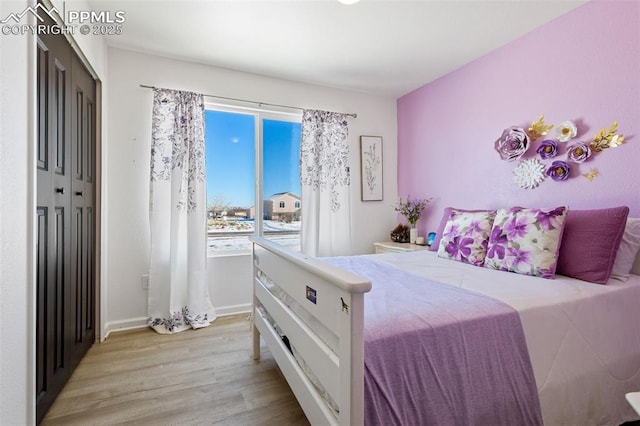 bedroom featuring light wood-type flooring