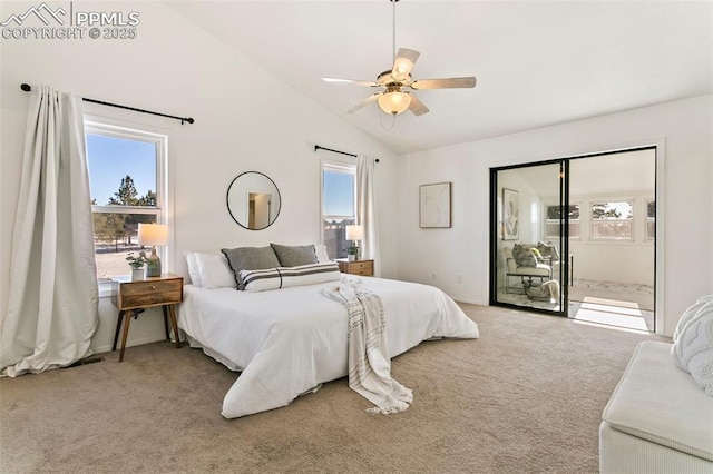 carpeted bedroom with vaulted ceiling and ceiling fan