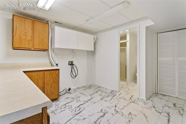 laundry area featuring cabinets, electric dryer hookup, and washer hookup