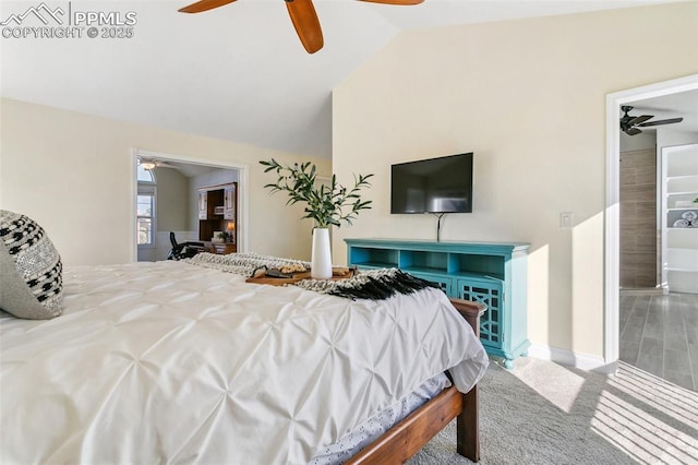 bedroom featuring lofted ceiling, ceiling fan, and carpet