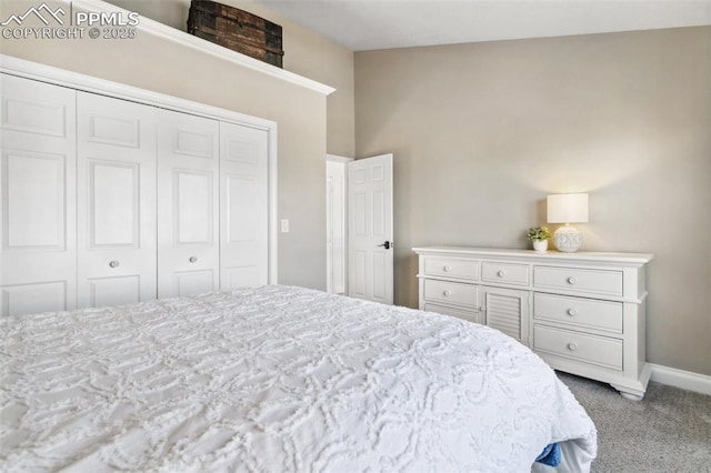 carpeted bedroom with a closet