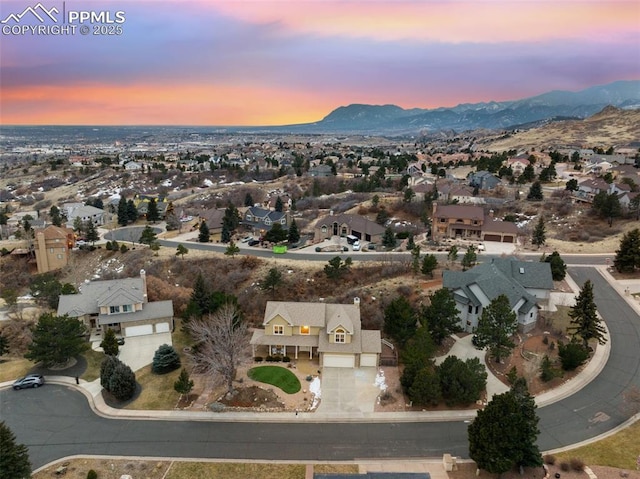 aerial view at dusk with a mountain view