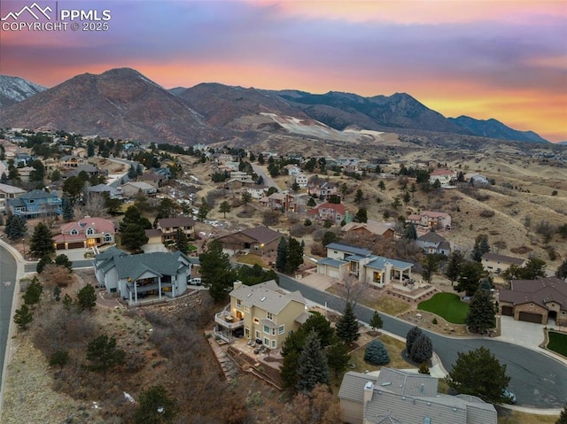 aerial view at dusk with a mountain view